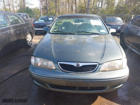 1998 Mazda 626 DX with VIN 1YVGF22C4W5768778, listed as a IAAI auction lot 41971066 with 119,168 mi miles. Bid and sale history available at carsss.com. Image 12.