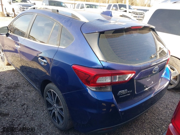 2017 Subaru Impreza Limited with VIN 4S3GTAU61H3748390, listed as a IAAI auction lot 40931014 with 135,929 mi miles. Bid and sale history available at carsss.com. Image 3.