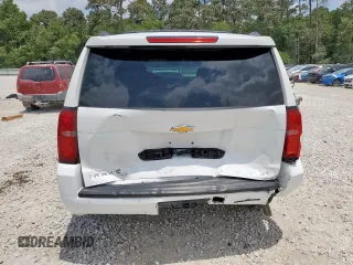 2019 Chevrolet Tahoe LT with VIN 1GNSCBKC1KR226315, listed as a Copart auction lot 57215915 with 153,170 mi miles and Salvage title. Bid and sale history available at DreamBid. Image 6.