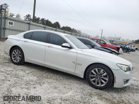 2013 BMW 7 Series 740i with VIN WBAYA6C51DD143769, listed as a Copart auction lot 41965165 with 158,686 mi miles and Clean Title. Bid and sale history available at carsss.com. Image 4.
