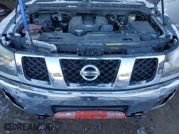 2005 Nissan Titan SE z VIN 1N6AA06B05N561722, wystawiony jako Copart lot #41987285 z przebiegiem 203 558 mil mil oraz Szkoda całkowita • Salvage title. Historia ofert i sprzedaży dostępna na DreamBid. Obrazek 11.