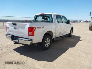 2015 Ford F-150 XLT with VIN 1FTEW1E89FKF04262, listed as a IAAI auction lot 41693065 with 182,387 mi miles. Bid and sale history available at carsss.com. Image 4.