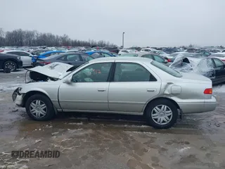 2001 Toyota Camry CE with VIN JT2BG22KX10540738, listed as a IAAI auction lot 41516912 with 116,733 mi miles. Bid and sale history available at carsss.com. Image 15.
