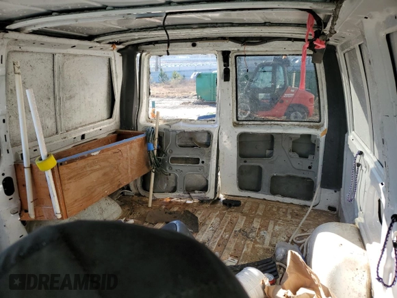 2004 Chevrolet Astro Cargo z VIN 1GCDM19X74B117502, wystawiony jako Copart lot #87210454 z przebiegiem Nie podano mil oraz Szkoda całkowita • Salvage title. Historia ofert i sprzedaży dostępna na DreamBid. Obrazek 10.