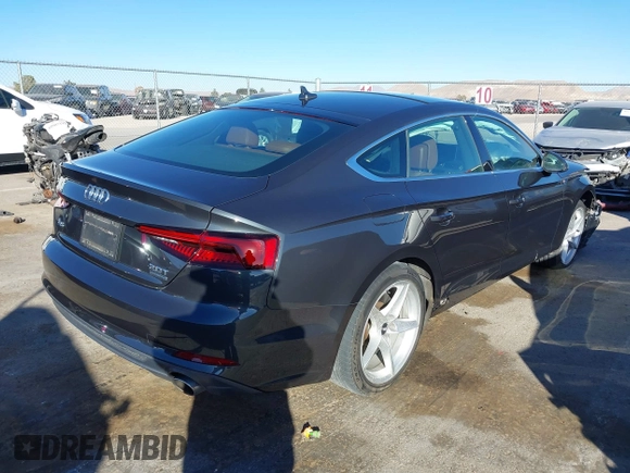2018 Audi A5 Sportback Premium z VIN WAUDNCF52JA044291, wystawiony jako IAAI lot #41219360 z przebiegiem 86 273 mil mil oraz . Historia ofert i sprzedaży dostępna na DreamBid. Obrazek 4.