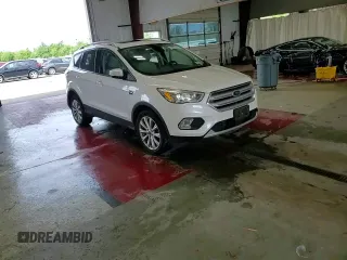 2018 Ford Escape Titanium с VIN 1FMCU9J90JUB30658, выставлен на аукционе Copart как лот 64001665 с пробегом 61 970 миль миль и Списание • Salvage title. История ставок и продаж доступна на DreamBid. Изображение 14.