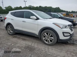 2015 Hyundai Santa Fe z VIN 5XYZWDLA9FG249515, wystawiony jako Copart lot #62689995 z przebiegiem 149 181 mil mil oraz Szkoda całkowita • Salvage title. Historia ofert i sprzedaży dostępna na DreamBid. Obrazek 4.