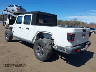 2020 Jeep Gladiator Rubicon with VIN 1C6JJTBG1LL181875, listed as a IAAI auction lot 41722037 with 51,037 mi miles and . Bid and sale history available at DreamBid. Image 3.