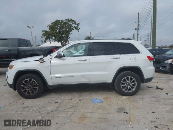 2014 Jeep Grand Cherokee Limited with VIN 1C4RJEBG1EC403972, listed as a IAAI auction lot 41455012 with 241,168 mi miles and . Bid and sale history available at DreamBid. Image 14.