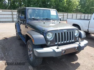 2016 Jeep Wrangler Unlimited Sahara with VIN 1C4BJWEG7GL340074, listed as a IAAI auction lot 42434763 with 81,095 mi miles and . Bid and sale history available at DreamBid. Image 6.