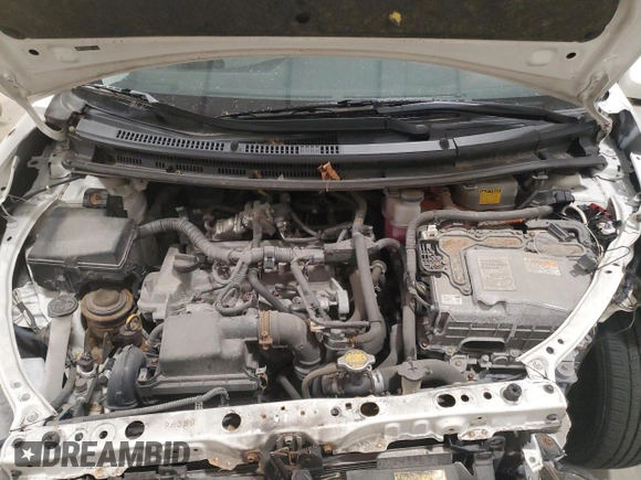 2014 Toyota Prius One z VIN JTDKDTB33E1558853, wystawiony jako Copart lot #57339425 z przebiegiem Nie podano mil oraz Nie do naprawy • Non repairable. Historia ofert i sprzedaży dostępna na DreamBid. Obrazek 11.