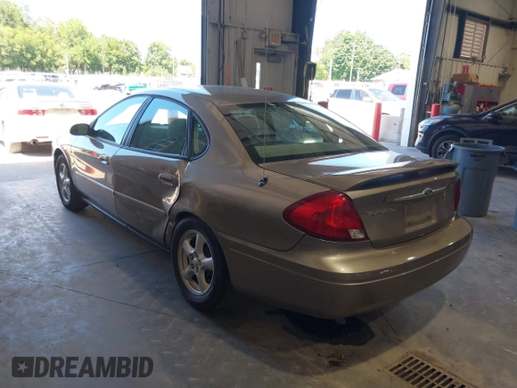 2003 Ford Taurus SE Standard with VIN 1FAFP53U13G229161, listed as a IAAI auction lot 39753697 with 94,195 mi miles. Bid and sale history available at carsss.com. Image 3.