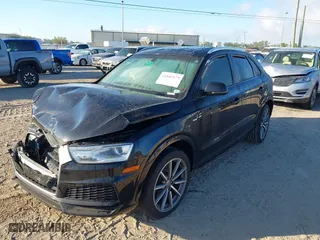 2018 Audi Q3 Premium with VIN WA1BCCFS2JR022258, listed as a IAAI auction lot 41845179 with 80,297 mi miles. Bid and sale history available at carsss.com. Image 2.