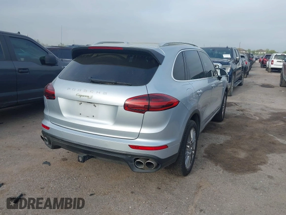 2016 Porsche Cayenne S E-Hybrid with VIN WP1AE2A26GLA59496, listed as a IAAI auction lot 41884022 with 85,386 mi miles and . Bid and sale history available at DreamBid. Image 4.