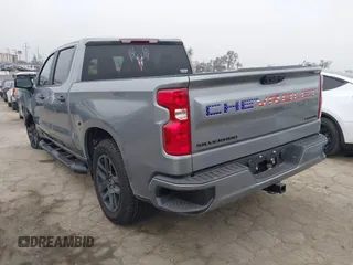 2024 Chevrolet Silverado 1500 Custom with VIN 3GCPABEK7RG311970, listed as a IAAI auction lot 42024754 with 7,976 mi miles and . Bid and sale history available at DreamBid. Image 3.