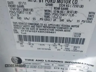 2011 Ford F-150 XL with VIN 1FTFW1EFXBKD89491, listed as a IAAI auction lot 41479190 with 242,797 mi miles. Bid and sale history available at carsss.com. Image 9.