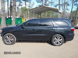 2012 Dodge Durango R/T with VIN 1C4SDHCTXCC130386, listed as a IAAI auction lot 41721300 with 109,229 mi miles and . Bid and sale history available at DreamBid. Image 15.