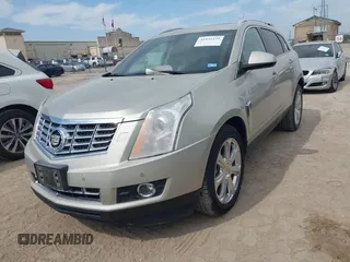 2013 Cadillac SRX Performance Collection with VIN 3GYFNDE34DS634099, listed as a IAAI auction lot 41931125 with 134,318 mi miles and . Bid and sale history available at carsss.com. Image 2.