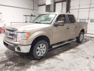 2014 Ford F-150 XL with VIN 1FTFW1EF9EKF69470, listed as a IAAI auction lot 41949077 with 195,933 mi miles. Bid and sale history available at carsss.com. Image 2.