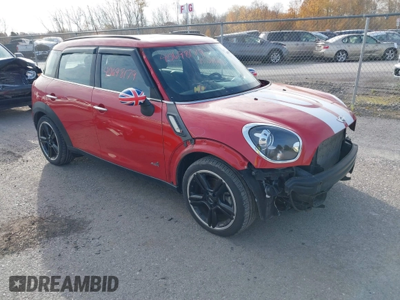 2015 MINI Cooper Countryman S with VIN WMWZC5C51FWP49282, listed as a IAAI auction lot 40698179 with 63,037 mi miles. Bid and sale history available at carsss.com. Image 1.