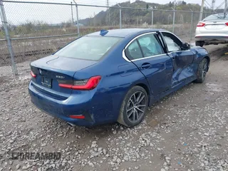 2021 BMW 3 Series 330i xDrive with VIN 3MW5R7J02M8C03547, listed as a IAAI auction lot 41961467 with 35,736 mi miles. Bid and sale history available at carsss.com. Image 4.