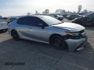 2021 Toyota Camry XSE z VIN 4T1K61AK5MU419419, wystawiony jako IAAI lot #41150544 z przebiegiem 56 387 mil mil oraz . Historia ofert i sprzedaży dostępna na DreamBid. Obrazek 1.