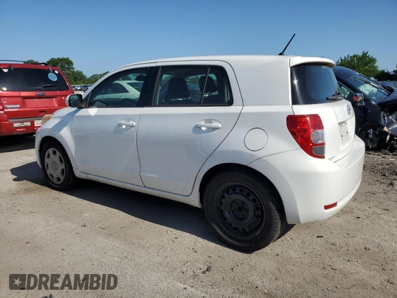 2009 Scion xD with VIN JTKKU10439J046749, listed as a Copart auction lot 60918345 with 126,995 mi miles and Salvage title. Bid and sale history available at DreamBid. Image 2.