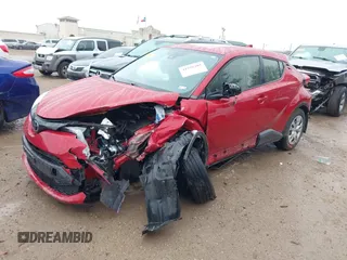 2020 Toyota C-HR LE with VIN JTNKHMBX4L1067648, listed as a IAAI auction lot 41556302 with 64,698 mi miles. Bid and sale history available at carsss.com. Image 2.