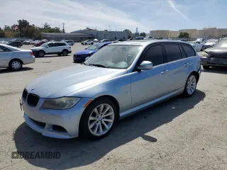 2010 BMW 3 Series 328i with VIN WBAUT9C58AA191275, listed as a Copart auction lot 52370155 with 130,933 mi miles and Salvage title. Bid and sale history available at DreamBid. Image 1.