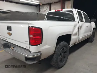 2018 Chevrolet Silverado 1500 LT with VIN 1GCRCREHXJZ288155, listed as a IAAI auction lot 41959980 with 114,919 mi miles and . Bid and sale history available at DreamBid. Image 4.
