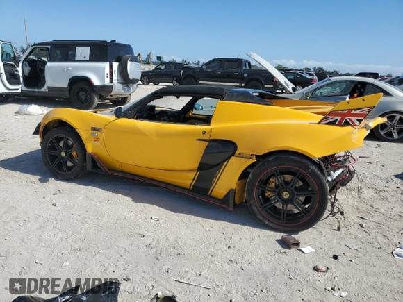2005 Lotus Elise z VIN SCCPC11105HL30103, wystawiony jako Copart lot #87713445 z przebiegiem Nie podano mil oraz Szkoda całkowita • Salvage title. Historia ofert i sprzedaży dostępna na DreamBid. Obrazek 2.
