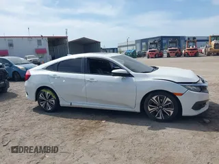 2018 Honda Civic EX-T z VIN 19XFC1F3XJE004123, wystawiony jako IAAI lot #42090933 z przebiegiem 81 228 mil mil oraz . Historia ofert i sprzedaży dostępna na DreamBid. Obrazek 13.