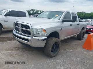 2012 Ram 2500 ST with VIN 3C6UD5CL5CG334735, listed as a IAAI auction lot 42439552 with 155,548 mi miles and . Bid and sale history available at DreamBid. Image 2.