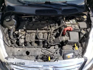 2012 Ford Fiesta SE z VIN 3FADP4BJ5CM195837, wystawiony jako Copart lot #57363165 z przebiegiem 108 003 mil mil oraz Szkoda całkowita • Salvage title. Historia ofert i sprzedaży dostępna na DreamBid. Obrazek 11.