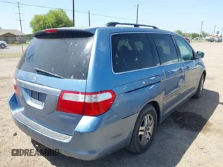 2005 Honda Odyssey EX-L with VIN 5FNRL387X5B083902, listed as a IAAI auction lot 42005085 with 249,861 mi miles. Bid and sale history available at carsss.com. Image 4.