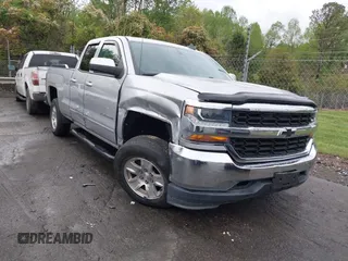 2018 Chevrolet Silverado 1500 LT with VIN 1GCVKREC7JZ151678, listed as a IAAI auction lot 41972011 with 106,892 mi miles and . Bid and sale history available at DreamBid. Image 1.