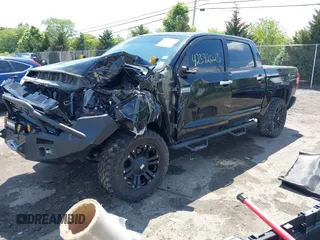 2014 Toyota Tundra Platinum with VIN 5TFAW5F15EX354983, listed as a IAAI auction lot 42392023 with 225,580 mi miles and . Bid and sale history available at DreamBid. Image 18.