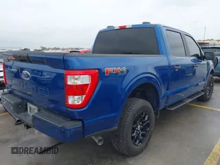 2023 Ford F-150 XL with VIN 1FTFW1E58PKD41387, listed as a IAAI auction lot 41870212 with 48,882 mi miles and . Bid and sale history available at DreamBid. Image 4.