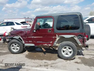 2001 Jeep Wrangler SE с VIN 1J4FA29P21P300094, выставлен на аукционе IAAI как лот 41871446 с пробегом 125 098 миль миль и . История ставок и продаж доступна на DreamBid. Изображение 14.