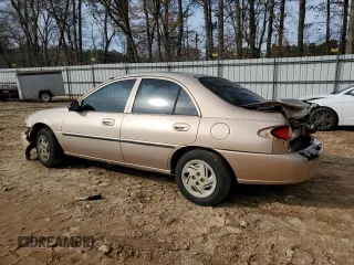 1999 Ford Escort LX with VIN 1FAFP10P6XW151186, listed as a Copart auction lot 43330275 with 88,655 mi miles and Salvage Title. Bid and sale history available at carsss.com. Image 2.
