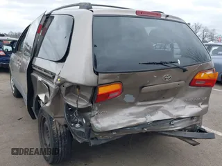 1999 Toyota Sienna LE with VIN 4T3ZF13C5XU121145, listed as a IAAI auction lot 41721171 with 229,760 mi miles and . Bid and sale history available at DreamBid. Image 3.