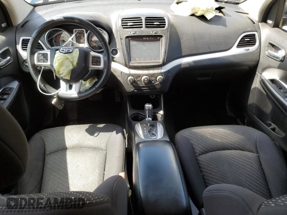 2013 Dodge Journey SXT with VIN 3C4PDCCG1DT637534, listed as a Copart auction lot 56992205 with 128,531 mi miles and Clean title. Bid and sale history available at DreamBid. Image 8.