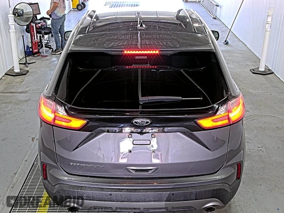 2021 Ford Edge Titanium z VIN 2FMPK3K92MBA53689, wystawiony jako IAAI lot #42501151 z przebiegiem 93 941 mil mil oraz . Historia ofert i sprzedaży dostępna na DreamBid. Obrazek 12.