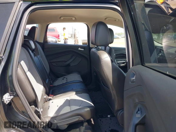 2017 Ford Escape SE with VIN 1FMCU0G9XHUE37185, listed as a IAAI auction lot 42053979 with 72,904 mi miles. Bid and sale history available at carsss.com. Image 8.