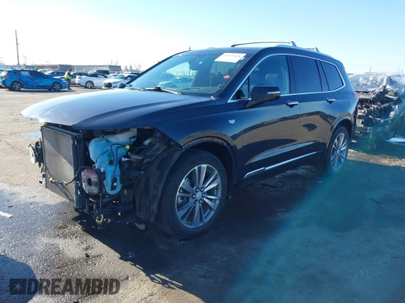 2022 Cadillac XT6 Premium Luxury with VIN 1GYKPFRS7NZ173703, listed as a IAAI auction lot 41335618 with 32,116 mi miles. Bid and sale history available at carsss.com. Image 2.