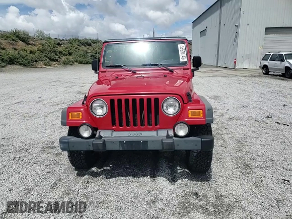 2003 Jeep Wrangler Sport with VIN 1J4FA49S83P369892, listed as a Copart auction lot 56536745 with 182,535 mi miles and Salvage title. Bid and sale history available at DreamBid. Image 14.
