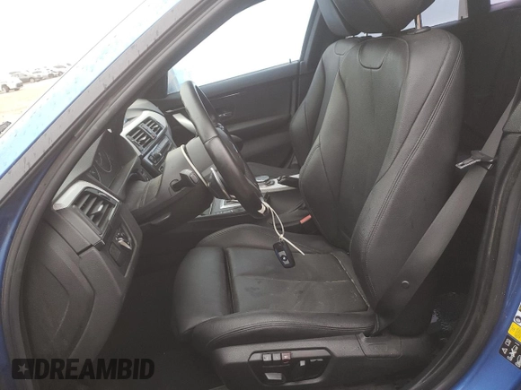 2015 BMW 4 Series 428i xDrive with VIN WBA4C9C5XFG135004, listed as a Copart auction lot 60551714 with 209,083 mi miles and Salvage Title. Bid and sale history available at DreamBid. Image 7.