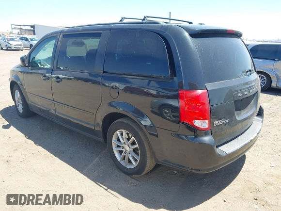 2014 Dodge Grand Caravan SXT with VIN 2C4RDGCG7ER265931, listed as a IAAI auction lot 42141644 with 205,968 mi miles and . Bid and sale history available at DreamBid. Image 3.