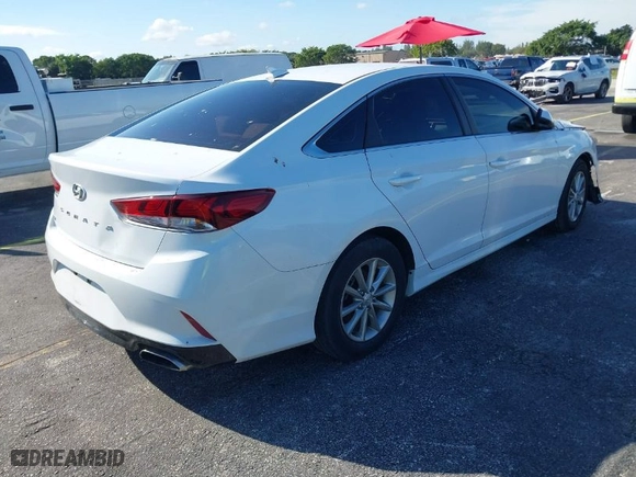 2019 Hyundai Sonata SE with VIN 5NPE24AF7KH791014, listed as a IAAI auction lot 41151136 with 101,469 mi miles. Bid and sale history available at carsss.com. Image 4.