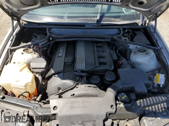 2000 BMW 3 Series 323Ci with VIN WBABM3345YJN83679, listed as a Copart auction lot 54029145 with 165,327 mi miles and Salvage Title. Bid and sale history available at DreamBid. Image 11.